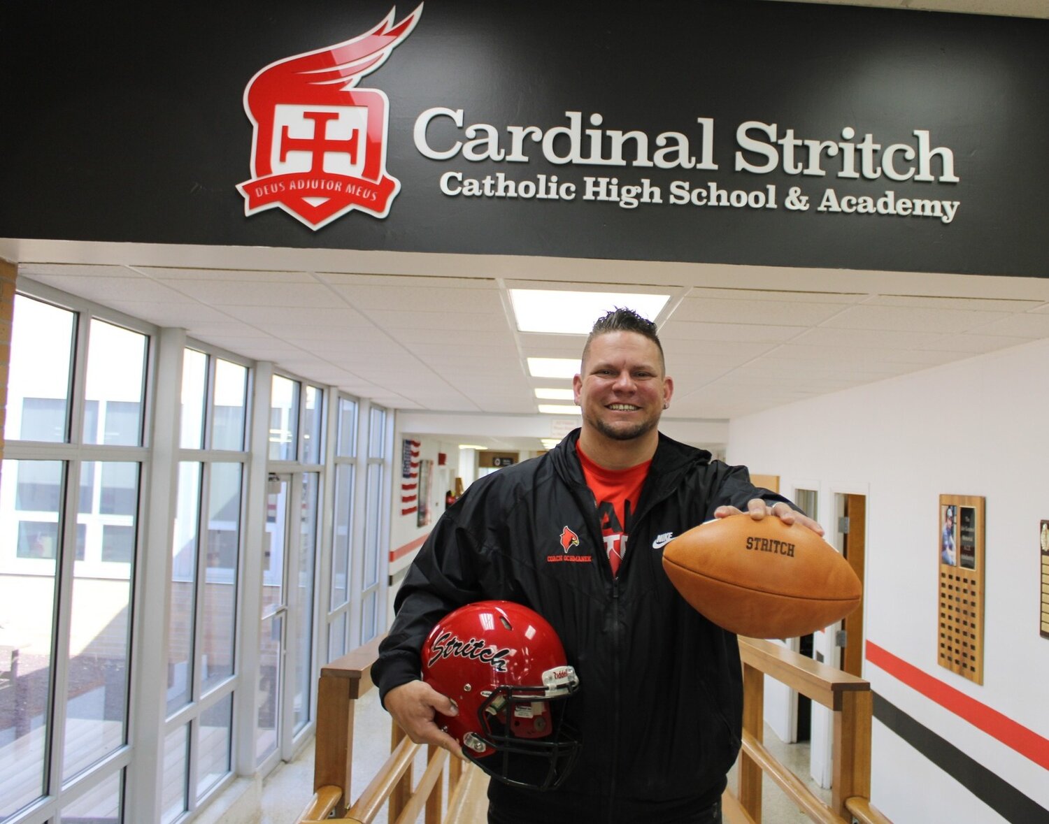 Ryan Ochmanek, the new head football coach at Cardinal Stritch, is pictured.