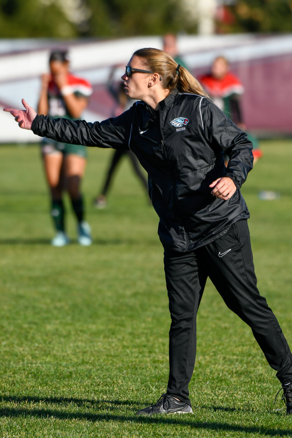 Eastwood girls soccer head coach Julie Cross shouts instructions to her team in a district championship game win over Oak Harbor on Oct. 26, 2024.
