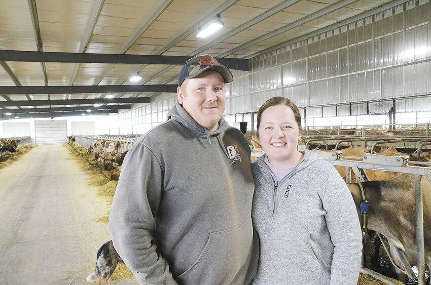 Corey and Kristen Metcalf take a break in the freestall barn April 18 on their farm near Milton, Wisconsin. The Metcalfs, along with Corey’s parents, Terry and Jane Metcalf, milk 750 cows and farm 1,200 acres.