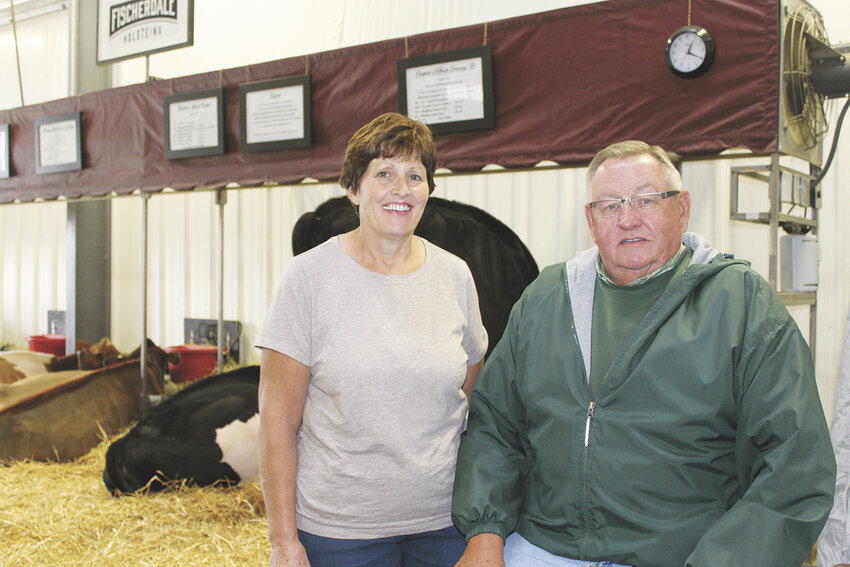Paula and Rick Bovre take a moment to relax Oct. 1, 2017, at World Dairy Expo in Madison, Wisconsin. The Bovres have managed the Great Northern Land and Cattle Company in Fond du Lac, Wisconsin, for 43 years, before selling the facility earlier this year.