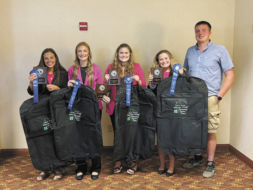 The senior team from St. Croix County — Makayla Weyer (from left), Lilly Peterson, Stella Kamm, Sophia Kamm and coach Ellis Frank — won the Wisconsin 4-H State Dairy Judging Contest Aug. 18 in Madison, Wisconsin. They will represent Wisconsin at the National 4-H Dairy Cattle Judging Contest Sept. 29 at World Dairy Expo in Madison.