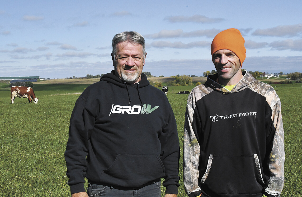 Jerry and Chris Wiebusch stand in their pasture Oct. 16 on their organic dairy farm near Lake City, Minnesota. The Wiebusches milk 80 cows and have 120 acres of pasture.