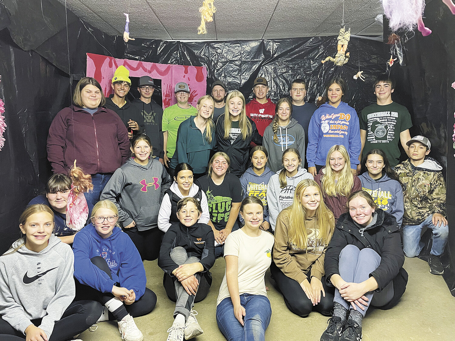 Whitehall FFA members gather at the site of their haunted house. The chapter focuses on community involvement, taking part in and hosting various service projects.