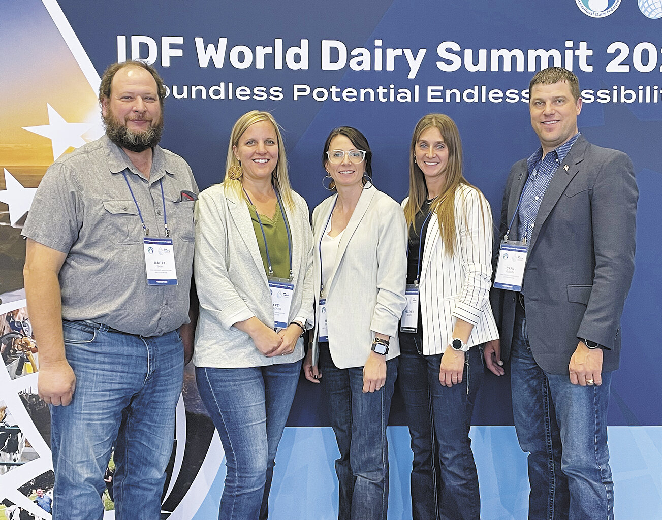 Marty Shay (from left), Patti Schaefer, director of milk marketing and member services at First District Association, Megan Schrupp, and Heather and Carl Olson pause for a group photo Oct. 18 at the International Dairy Federation World Dairy Summit in Chicago. Dairy farmers Shay, Schrupp and the Olsons attended the summit with support from First District Association as members of its Young Cooperator program.