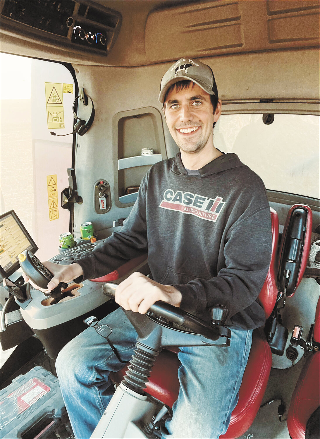 Marshall Friese drives combine Oct. 19, 2023, one month after his liver surgery at the Mayo Clinic in Rochester, Minnesota. Friese was able to return to work on the dairy farm in November 2023.