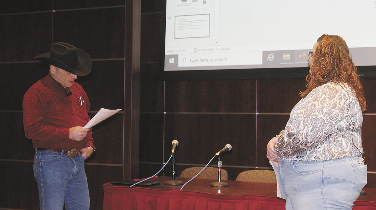 Brad Guse (left) and Amanda Borkowski perform a skit showing how farmers might struggle to communicate about stress Jan. 26 during the central Wisconsin Farm Stress Summit in Marshfield, Wisconsin.