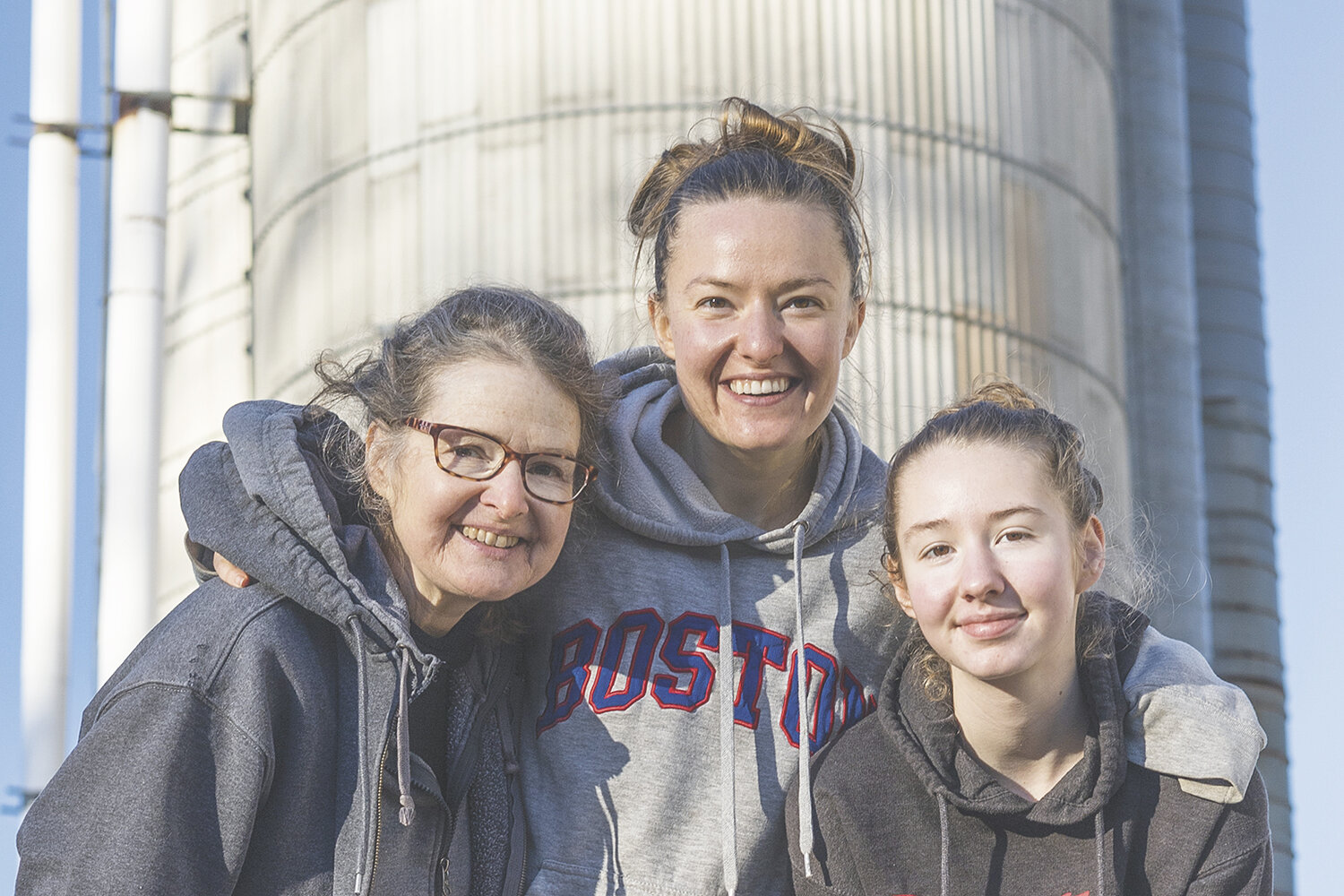 Wendy Dornbusch (from left), Annalee Beaver and Carolyn Dornbusch stand Jan. 1 at the Dornbusch farm near Perham, Minnesota. Carolyn helps with the marketing and graphic design when she has time between schooling.