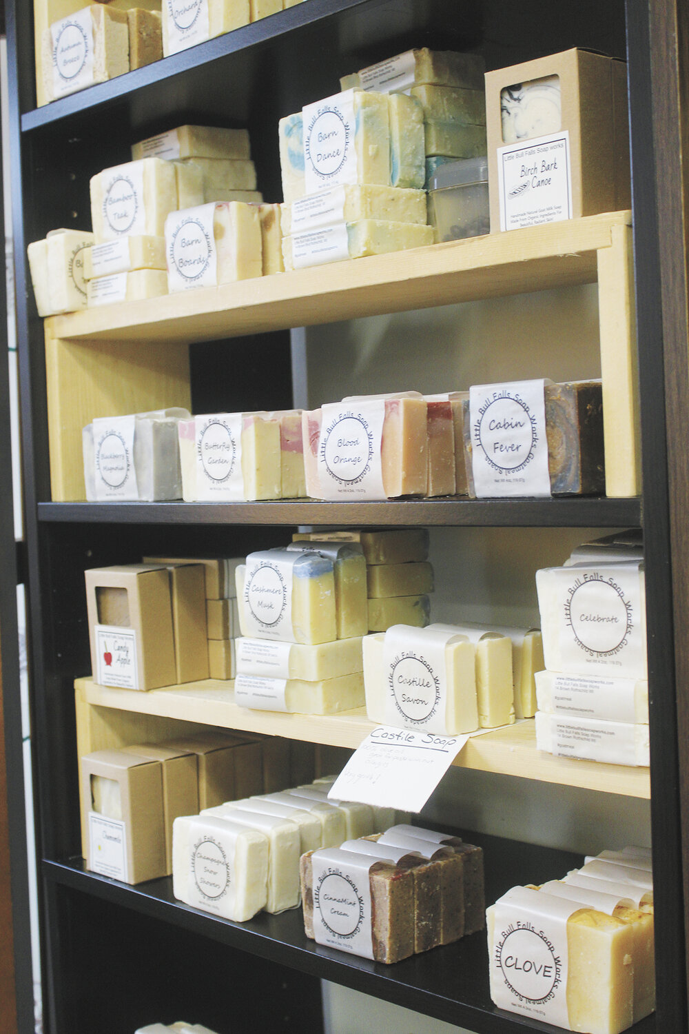Some of the more than 100 varieties of soap made from goat’s milk sit on the shelves Feb. 3 at Little Bull Falls Soap Works in Rothschild, Wisconsin. Michelle Neathery uses nearly 100 pounds of powdered goat’s milk each year to make the soaps.