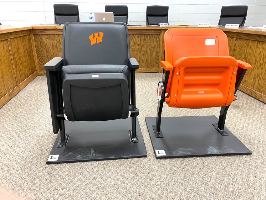 Samples of the new arena seats were shown at the Warren School Board meeting.