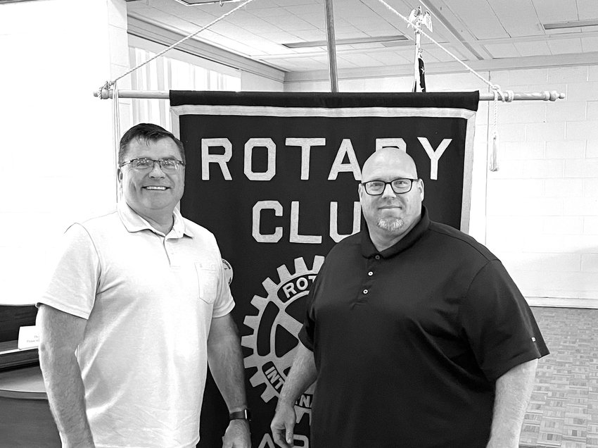 Rotarian David Richey and Hermitage High School Football Coach Chase Ellis.