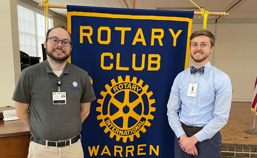 Warren Rotary Club President Dennen Cuthbertson (left) introduced Tyler Turner of Arkansas Hospice (right) as the guest speaker.