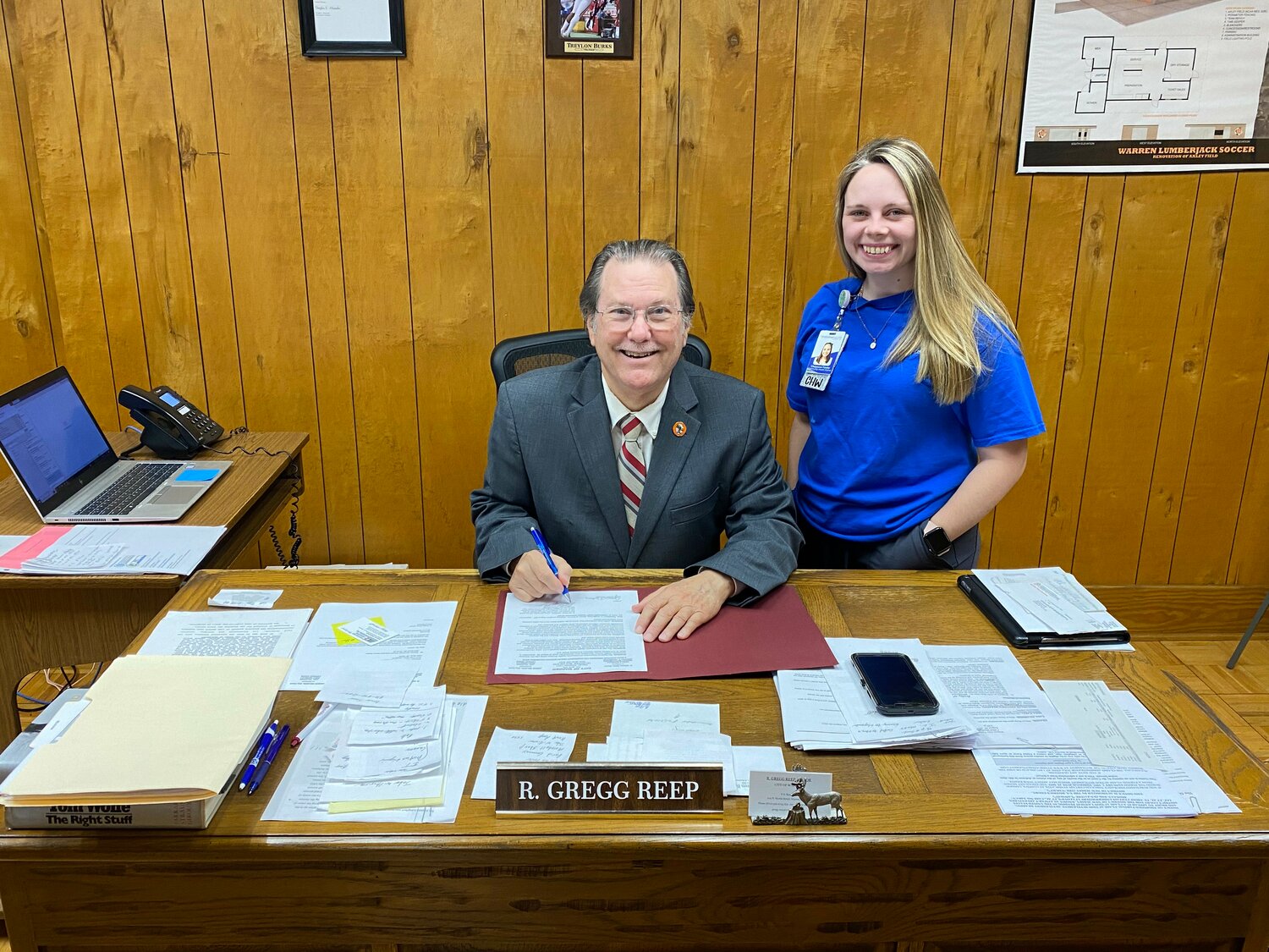Mayor Gregg Reep signed a proclamation for Community Health Workers Awareness Week. Pictured: Mayor Reep and Cheyenne Fowler, from Mainline.