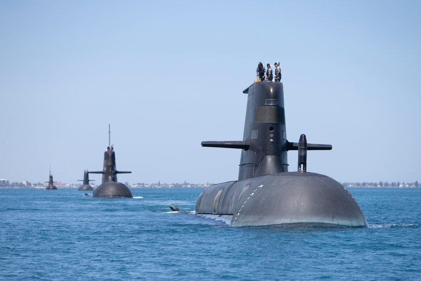 Royal Australian Navy Collins Class Submarines joined in formation by United States Navy Los Angeles Class Submarine USS Santa Fe in the West Australian Exercise Area for a photo opportunity in February 2019.