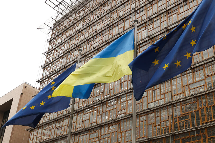 EU and Ukrainian flags fly in Brussels, Belgium.