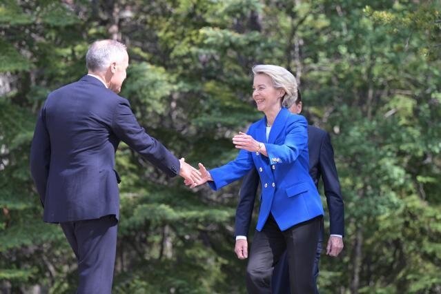 Ursula von der Leyen, President of the European Commission, greeting Canadian Premier Mark Carney