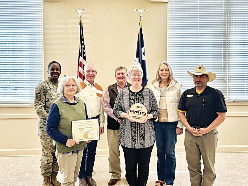 Pictured (back row, left to right) Fort Cavazos Garrison Commander Colonel Lakicia Stokes, Belton Mayor David Leigh, Mayor Gary Chumley, and Rosemary Whittle. (front row, left to right) Celeste Drake, Fran Henshoher, and Leo Corona.