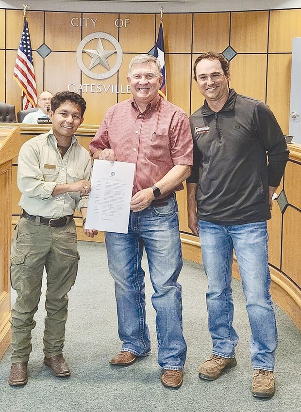 Pictured (left to right) is Hector Marines-Cho with the Texas A&M Forest Service, Mayor Gary Chumley, and Parks and Recreation Director Seth Phillips.