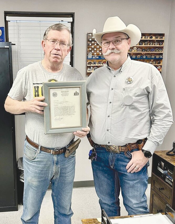 Care Center Director Deral McWhorter is pictured with Coryell County Sheriff Scott Williams.