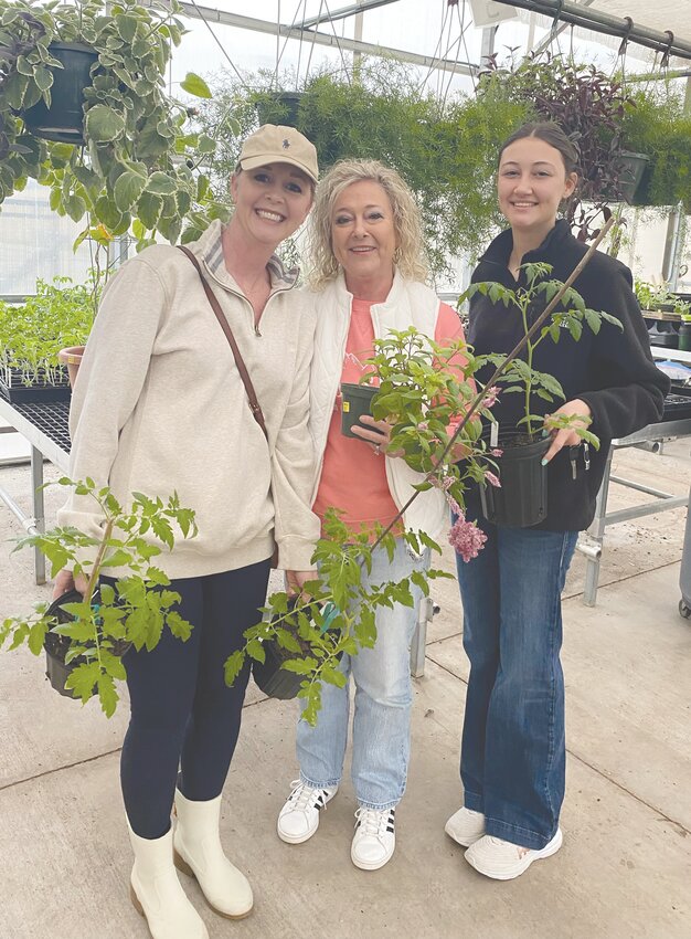 Three generations of "greenhouse shoppers." Pictured left to right, Cheyenne Kizer, Tammy Barnett, and London Kizer.