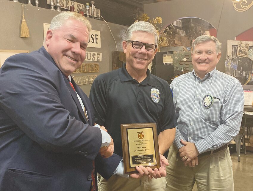 At a recent Lions Club meeting, Gatesville Police Chief Brad Hunt (pictured center) was presented with a plaque of appreciation for the outstanding work he did during the eclipse. Pictured left is Ft. Cavazos Logistics Officer James Marques, and pictured right is Mayor Gary Chumley.