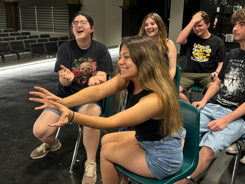 During the summer improv comedy clinic, Jaycee Shelton, Sarah Kiphen, Emery Wood, Josh Appelman, and Royce Wright play a round of “Bus Stop,” one of the many improvised games the students learned during the camp