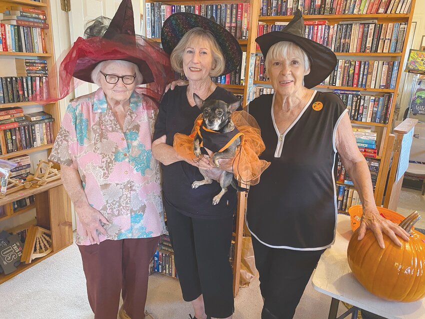 The bewitching ladies at the Cottage Book Store at Pearl are gearing up for the Halloween holiday. They were joined by the bookstore mascot, Mimi, who was dressed for the occasion wearing an orange tutu. Pictured left to right: Kay Pruett, Corlisa Cunningham, and Linda Ray.