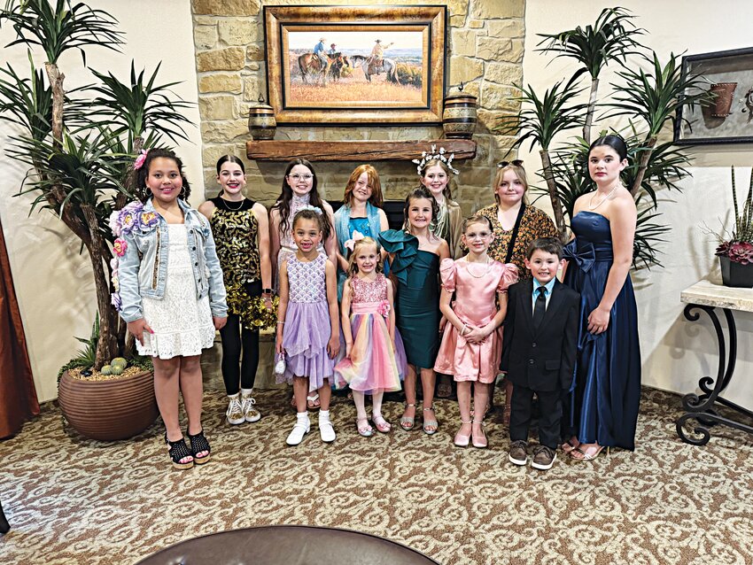 Pictured in the back row (left to right) are Chloe-Noelle Campbell, Lillie Mann, Coralise Ivy, Ariella Felber, Julie Lusk, Natalie Gore, and Zoe Hipp. Pictured in the front row (left to right) are Leya Campbell, Acelynn Hodges, Olivia Long, Mackinlee Martin, and Silas Dorman.