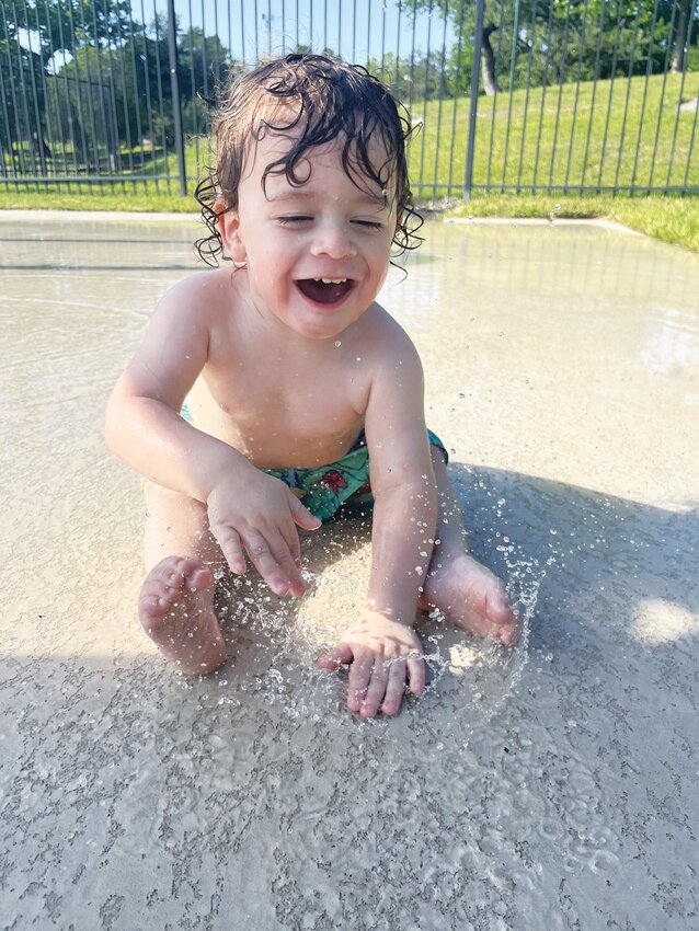 Daniel Smith, son of CJ and Jillian Smith of Gatesville, is pictured at the splash park which will be open for the BBQ with a Badge event on May 31.