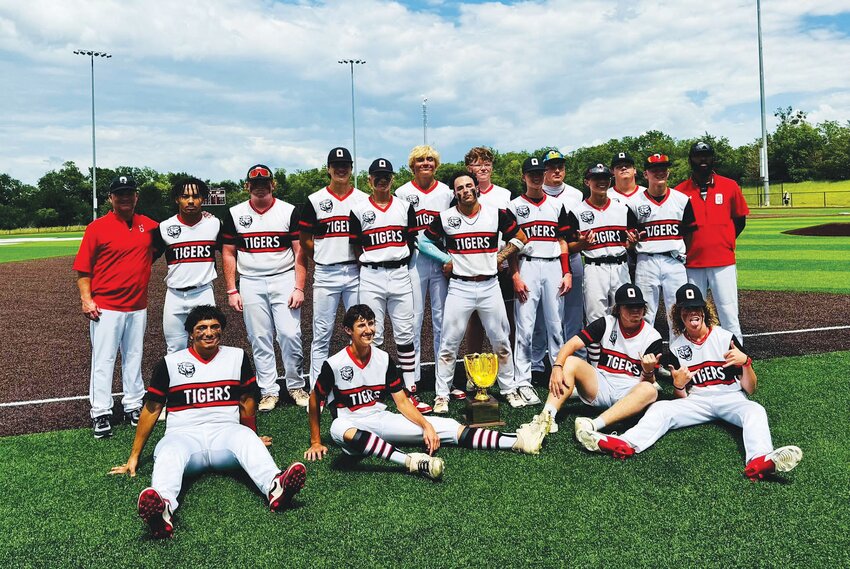 Oglesby Head Baseball Coach Trent Padron and Assistant Coach/OISD Superintendent Shane Webb are pictured with the Tigers after the team claimed the title of area champions.