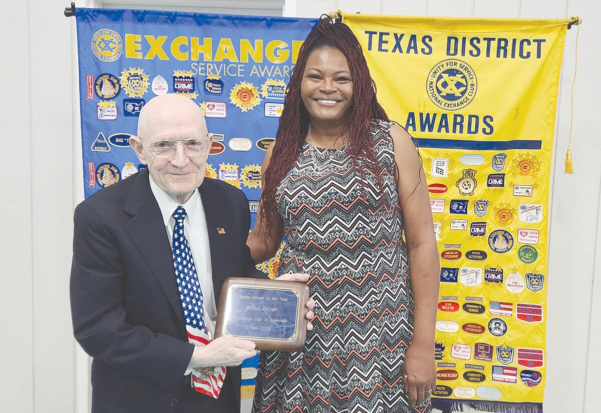 Camilla Edge of the Gatesville Senior Center presented the “Senior Citizen” award to long-time center volunteer Rebel Brown.