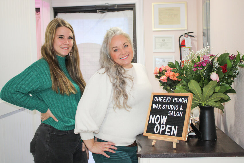 Billie Watson, right, owner of The Cheeky Peach Wax Studio & Esthetics is pictured with Emily Barton, left, who will serve as the studio’s second esthetician.