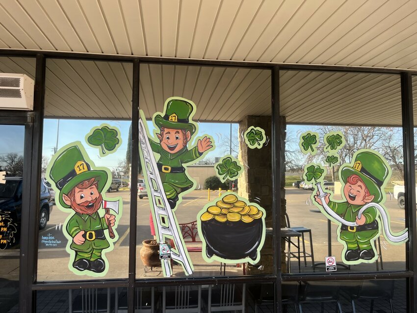 From fall to Christmas to St. Patrick’s Day, Andrea Taylor is constantly painting seasonal-themed window designs for businesses all around the area.