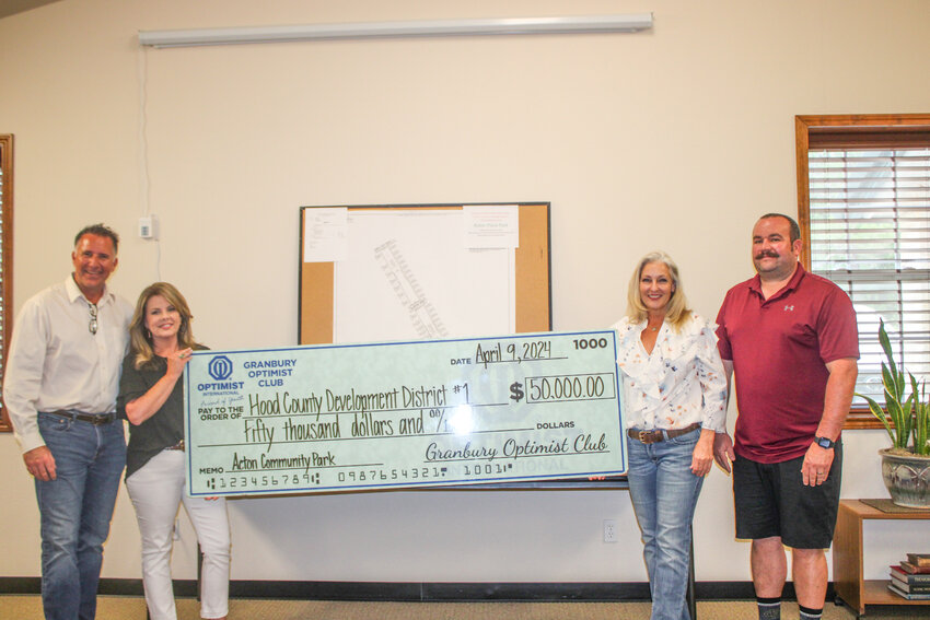 Granbury Optimist Club donated $50,000 to the Hood County Development District No. 1 to be used for the purchase of playground equipment for Acton Place Park.