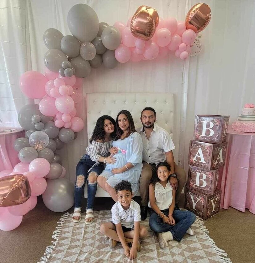 Rosemar Colon is the owner of Jax2. She is pictured with her husband Maberik and her children Joymaris, Angelee and Jacob. At the time this picture was taken, she was pregnant with her youngest daughter, Alisabeth.