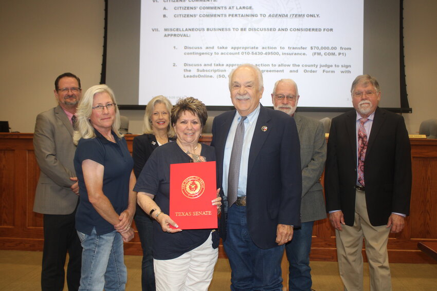 Granbury resident Gail Joyce was honored with a surprise proclamation by the Texas State Senate during a regularly scheduled meeting of the Hood County Commissioners Court May 14.