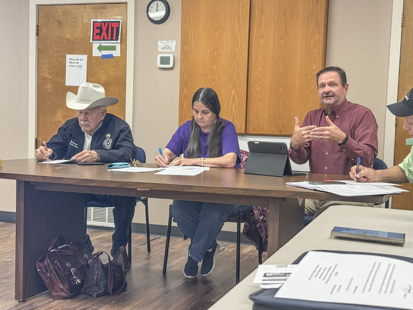 Hospital District board member and Precinct 1 Commissioner Kevin Andrews explains to the board why he brought back the vote for two resolutions, during a regularly scheduled meeting March 7.