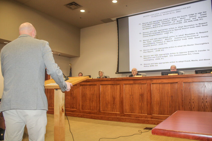 Ryan Jones, team leader at Teague, Nall & Perkins Inc. speaks to the Hood County Commissioners Court March 11 and expresses his thanks for their collaboration in getting the Master Thoroughfare Plan adopted.