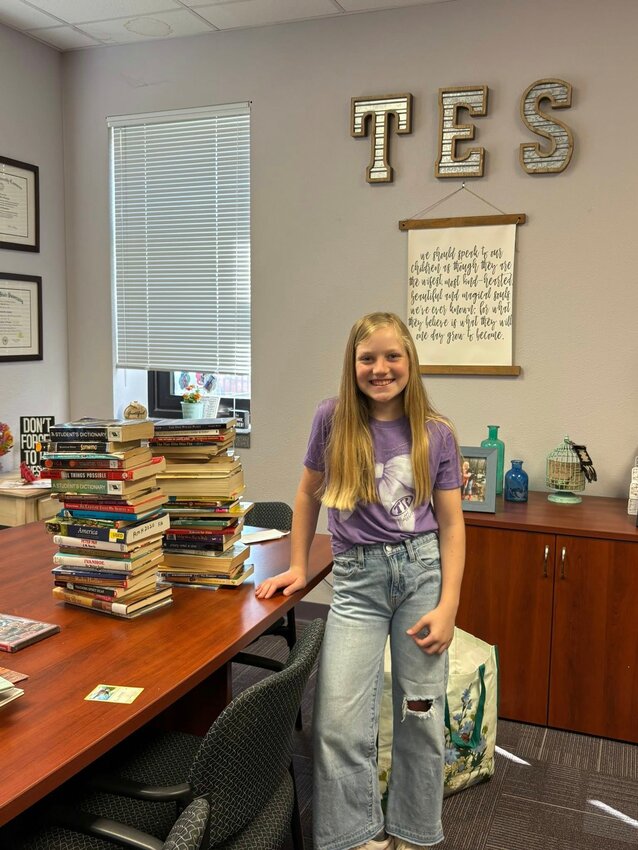 Tildy Reuther was lucky enough to be the Tolar elementary principal for a day. She made some book towers in her limited free time.