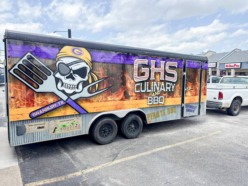 Desserts, beans, chicken, ribs, and brisket are served in GHS BBQ teams pit, Their bringing the ‘HEAT’ with their cooking and new wrap for their trailer.