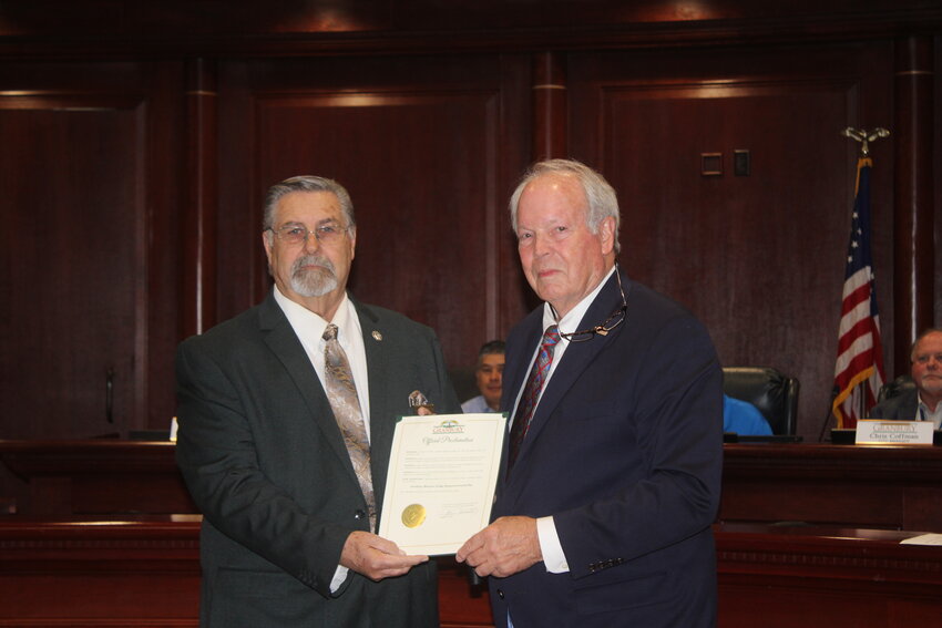 Gary Merritt, a representative from Granbury Masonic Lodge No. 392, accepts the proclamation from Mayor Jim Jarratt that designates May 25, 2024 as Granbury Masonic Lodge Sesquicentennial Day.