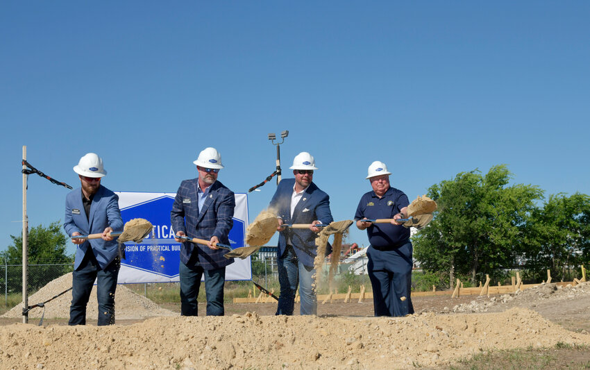 (From left) Chance Roberts, Nate Roberts, Wade Turner, and Cresson Mayor Ron Becker break ground at Practical Metals.