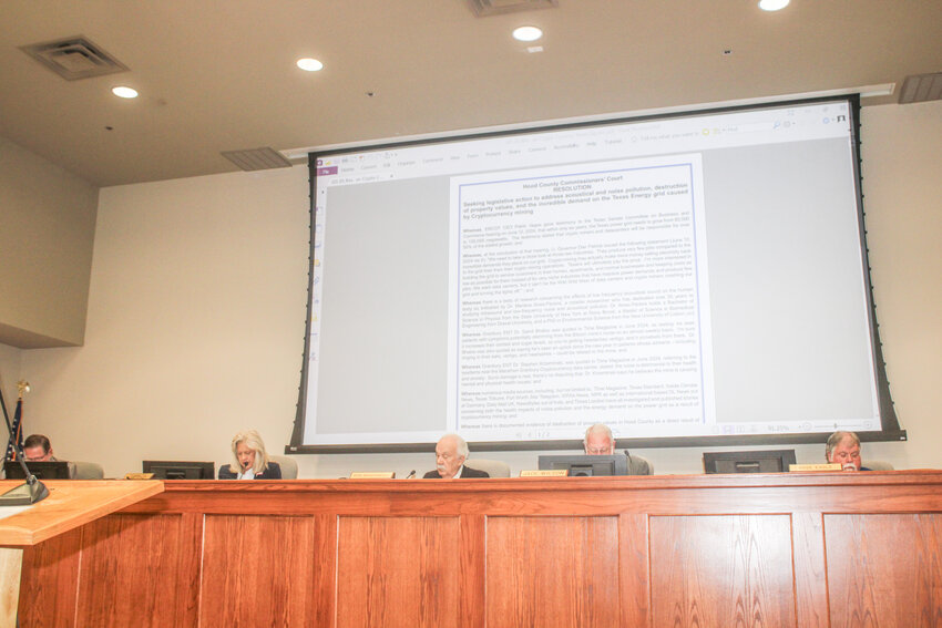 Precinct 2 Commissioner Nannette Samuelson reads a resolution seeking legislative action to address the acoustical and noise pollution from the bitcoin mining plant during a regularly scheduled Hood County Commissioners Court meeting July 23.
