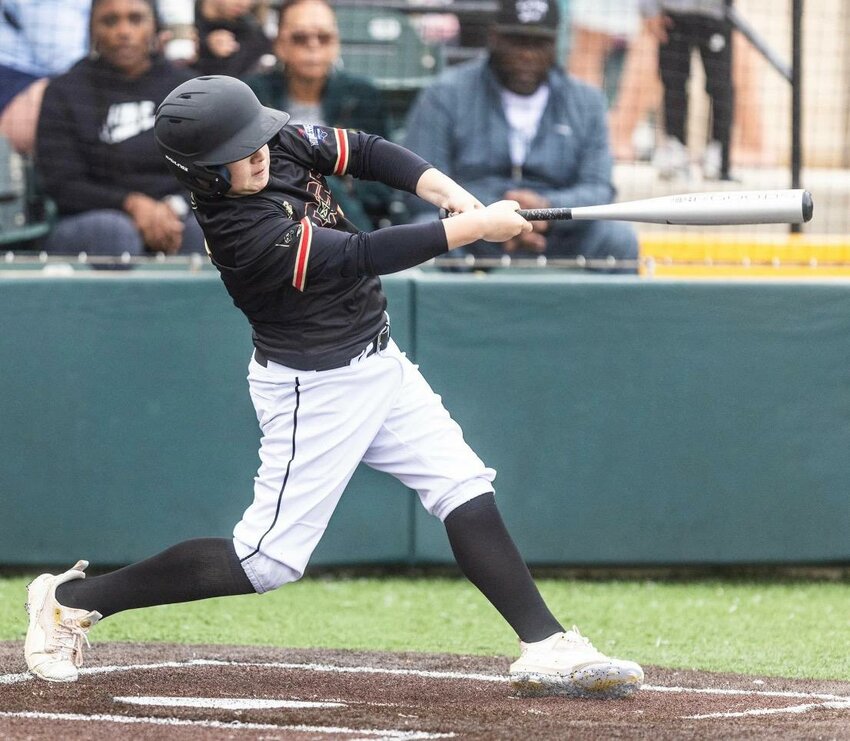 Texas Edge first baseman Colton Alford swings for a home run in 2024’s tournament.