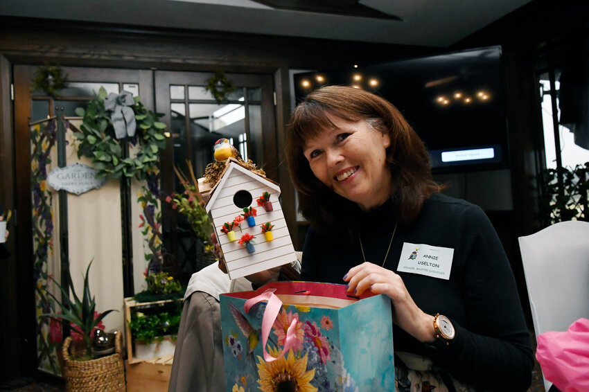 Guest speaker and avid birdwatcher Annie Uselton showing off the birdhouse she was gifted by the Granbury Garden Club.