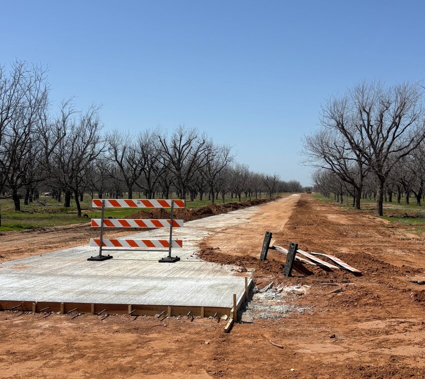 Eight miles of roads have been constructed through the old Leonard Farms orchard for Pecan’s new neighborhood, Landing’s East.