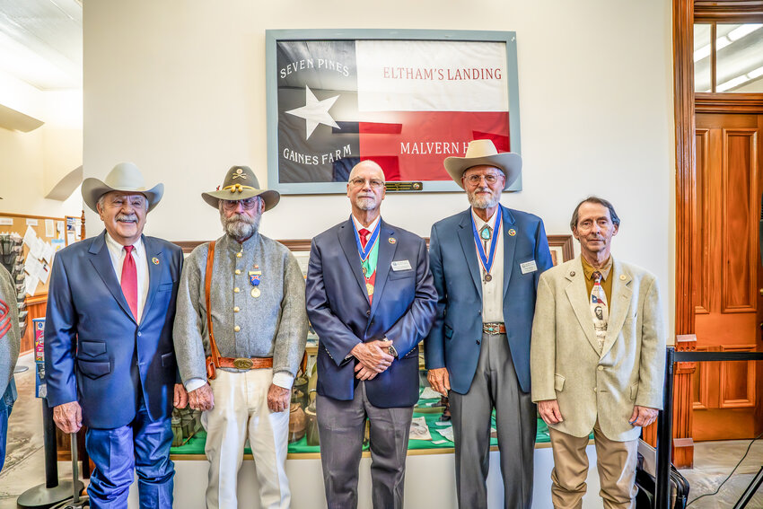 Members of the David Crockett Chapter of the Sons of the Republic of Texas (SRT) and Hood’s Texas Brigade Association Reactivated gathered to witness the unveiling of Gen. John Bell Hood’s first Texas infantry brigade flag June 13.
