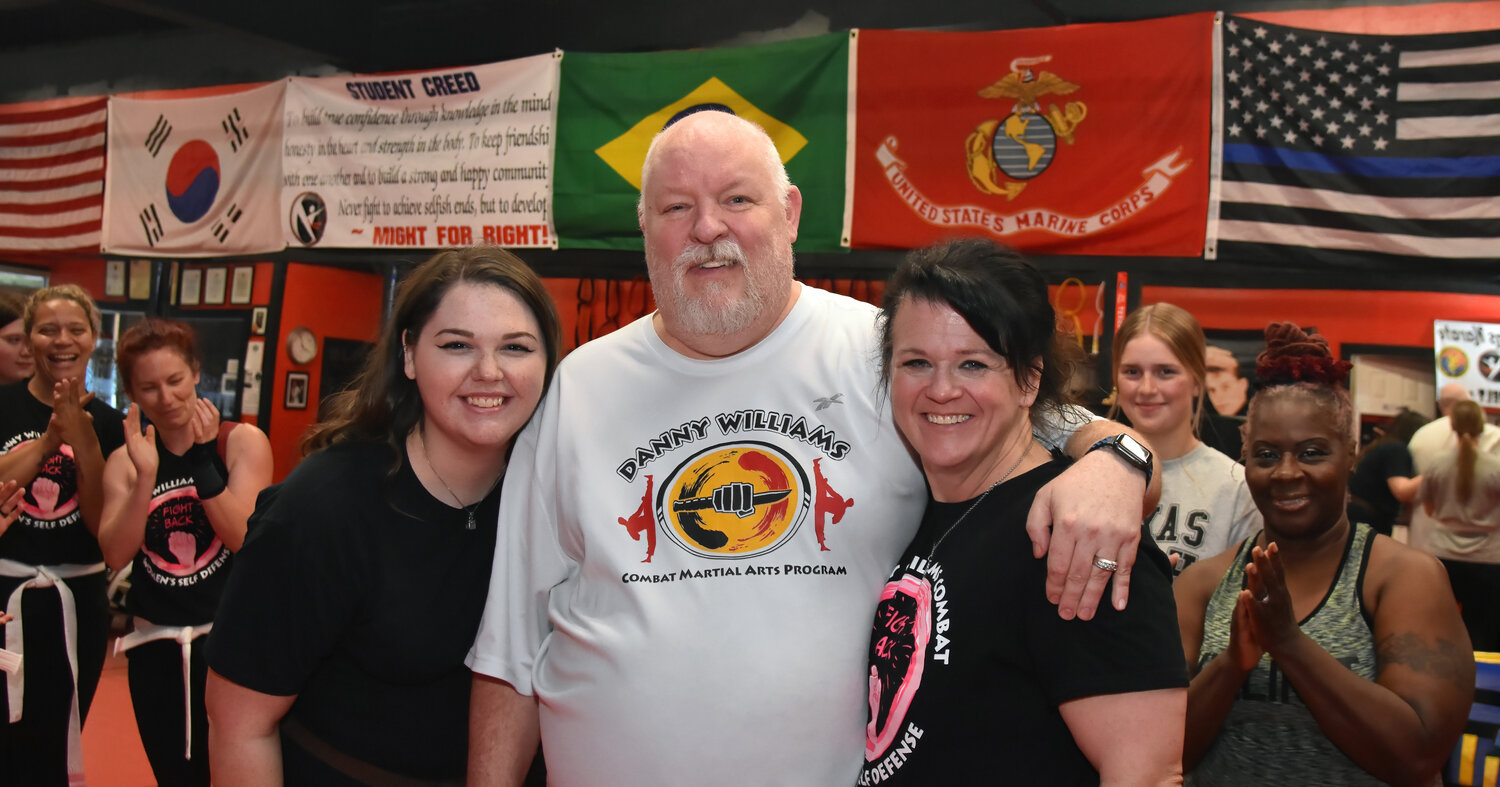 Abby Williams, left, sometimes joins her parents Danny and Glenda Williams at their Granbury martial arts studio.
