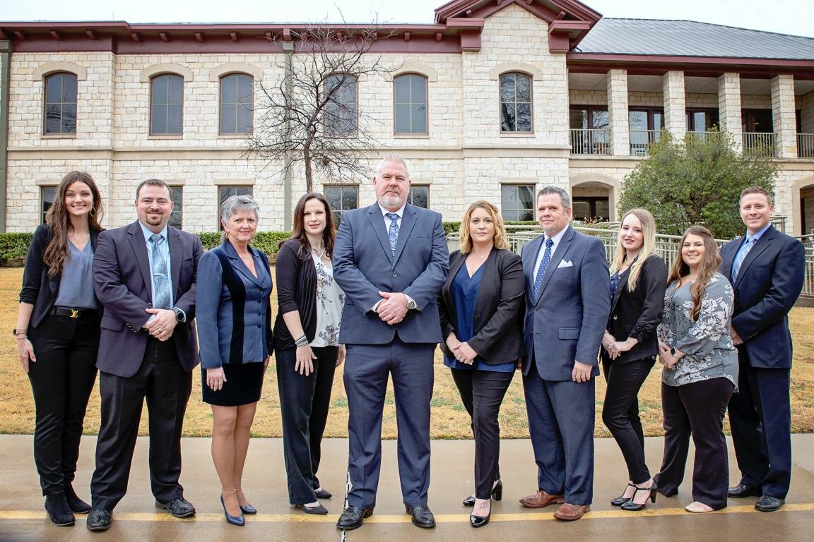 Kellye SoRelle, fifth from right, worked for the Hyde Law Firm but resigned in May 2020 - the same month that, according to court documents, she began living with Oath Keepers founder Stewart Rhodes in a rented house in Granbury.