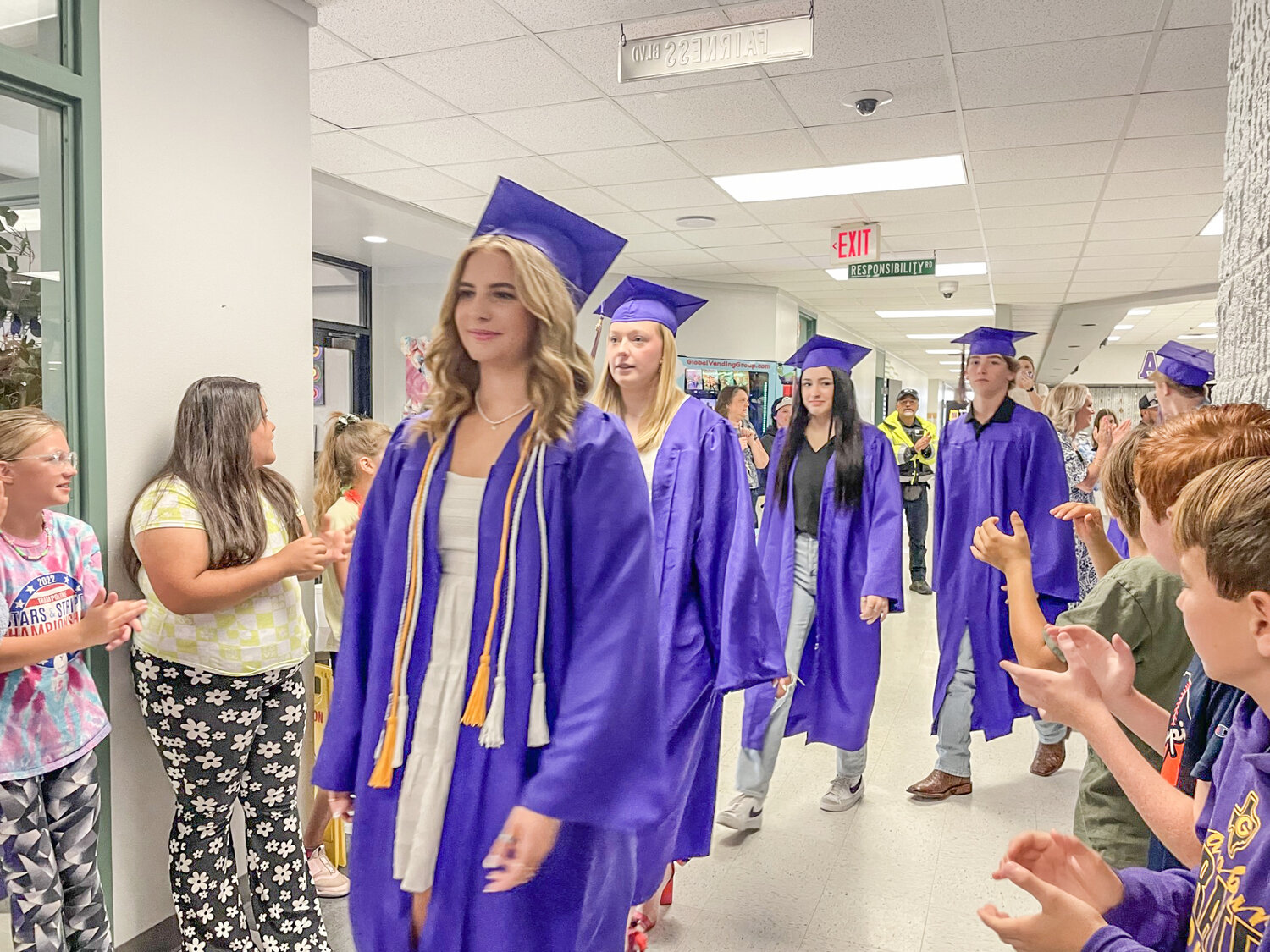 It was a bittersweet moment for Acton Elementary School on May 23, when the traditional Granbury High School Senior Walk was held only minutes before its annual kindergarten graduation ceremony. 