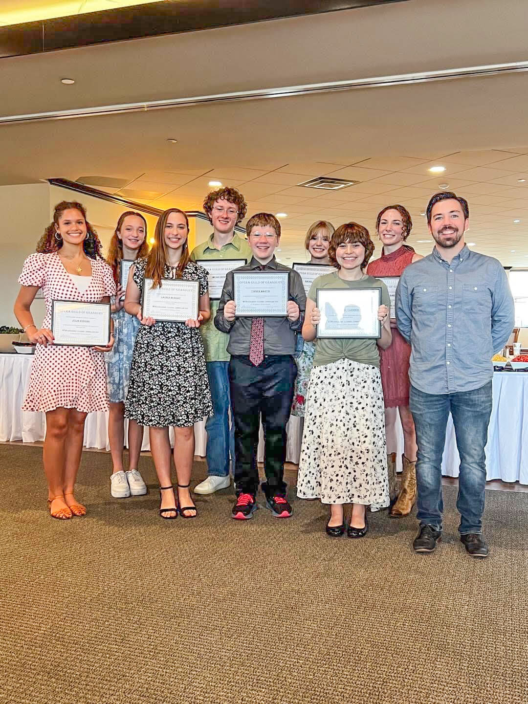 Eight Granbury Theatre Academy students received scholarships from the Opera Guild of Granbury during its last meeting totaling $5,450. Pictured are (from left) Julia Huggins, Meghan Murray, Lauren Murray, Micah Chesney, Topher Martin, Rachel Mastick, Lily (Finch) McClendon, Hannah Baker and Granbury Theatre Academy Director, Matt Beutner.